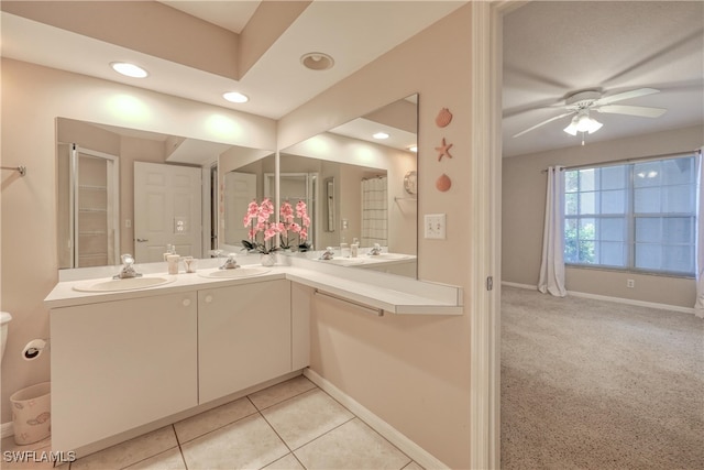 bathroom featuring vanity, tile patterned floors, and ceiling fan