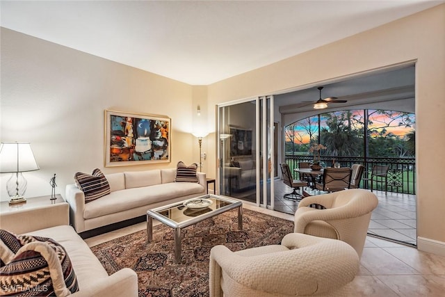 tiled living room with ceiling fan