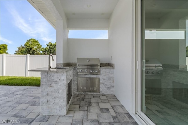 216 Chiquita Blvd N, Cape Coral, FL 33993 - view of patio featuring a sink