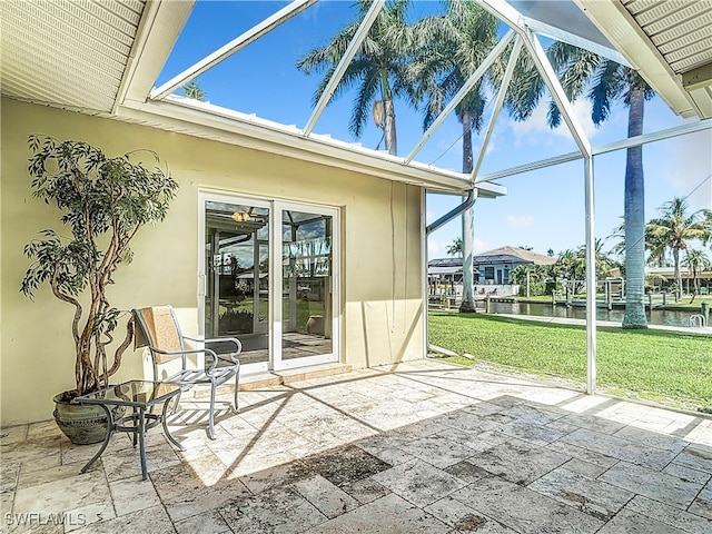 exterior space with a water view and a wealth of natural light