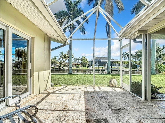 unfurnished sunroom with a healthy amount of sunlight