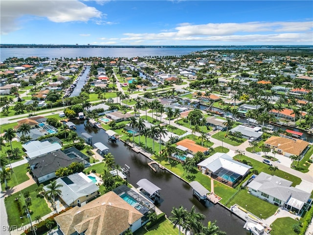 bird's eye view with a water view