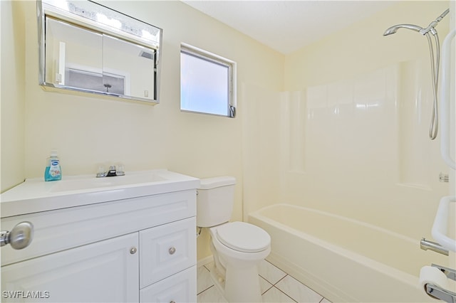 full bathroom featuring vanity, bathtub / shower combination, toilet, and tile patterned flooring