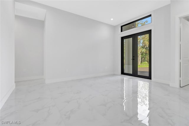 spare room with french doors