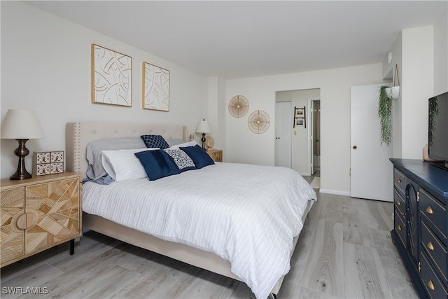 bedroom with light wood-type flooring