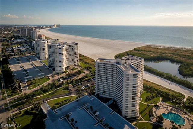 bird's eye view with a water view and a view of the beach