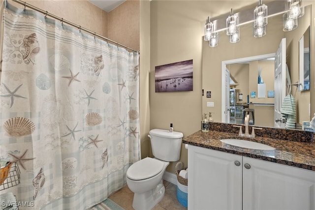 bathroom with a shower with shower curtain, vanity, toilet, and tile patterned floors