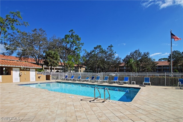 view of swimming pool featuring a patio