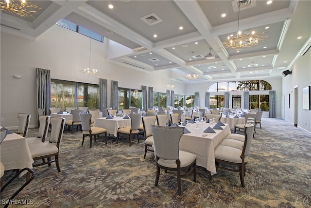 carpeted dining room with beam ceiling, coffered ceiling, a towering ceiling, and an inviting chandelier