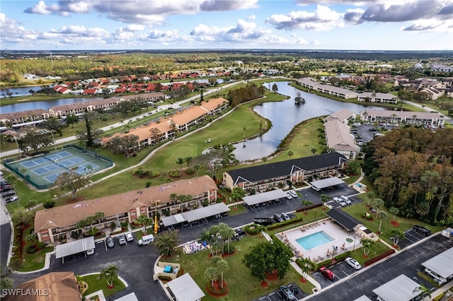 bird's eye view with a water view