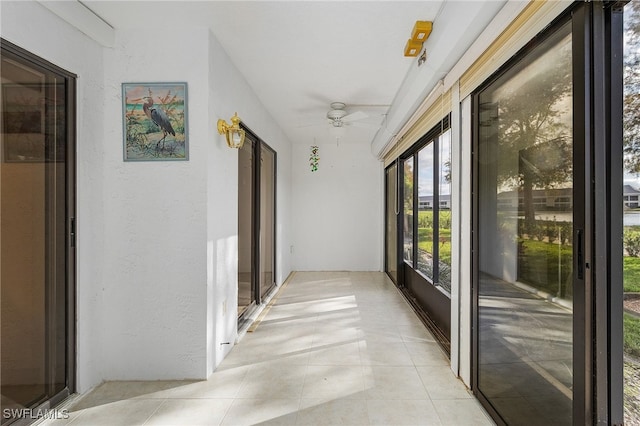 hallway with light tile patterned flooring