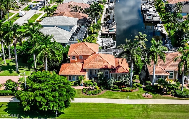 bird's eye view with a water view