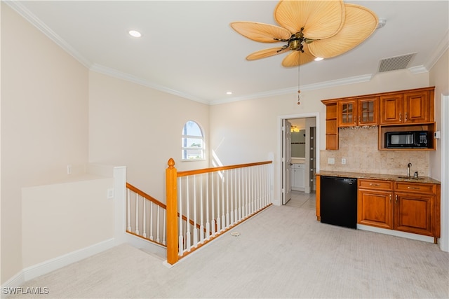 kitchen with backsplash, ornamental molding, light colored carpet, ceiling fan, and black appliances