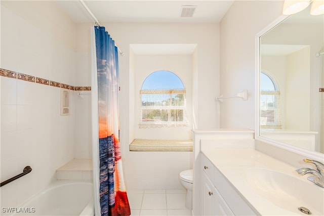 full bathroom with tile patterned floors, vanity, toilet, and shower / tub combo