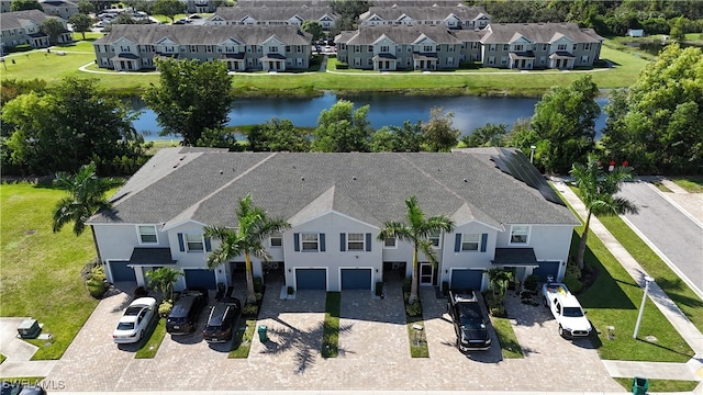 bird's eye view with a water view