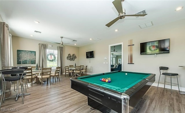 rec room featuring light wood-type flooring, ceiling fan, and billiards