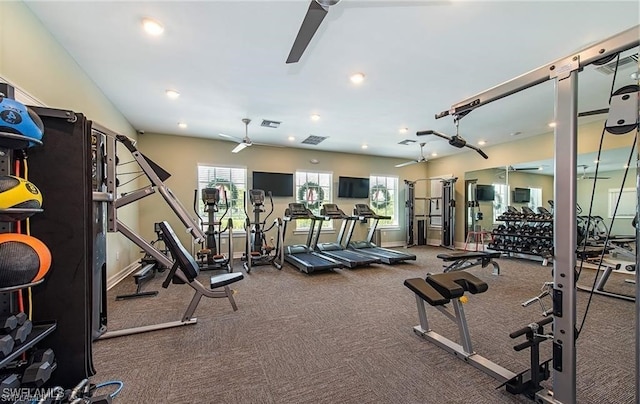 gym with ceiling fan, carpet floors, and a healthy amount of sunlight