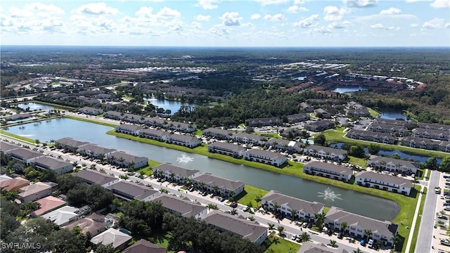 aerial view featuring a residential view and a water view