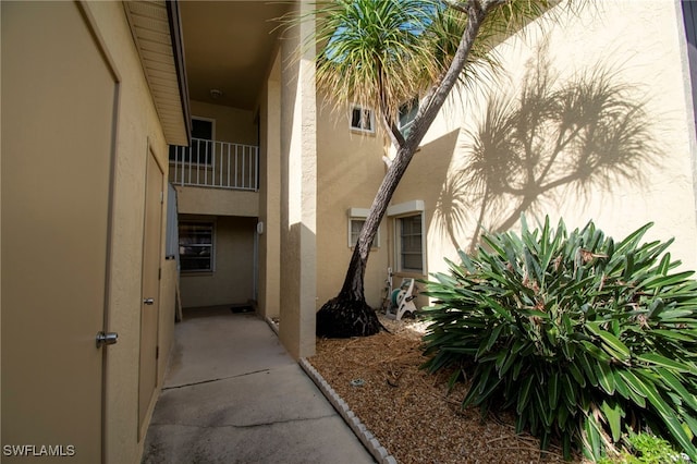 view of property exterior with a balcony