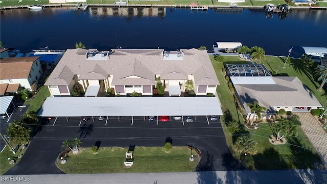 birds eye view of property featuring a water view