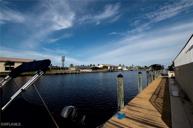 dock area featuring a water view