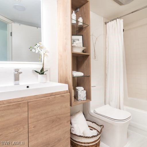full bath featuring shower / tub combo, vanity, visible vents, and toilet