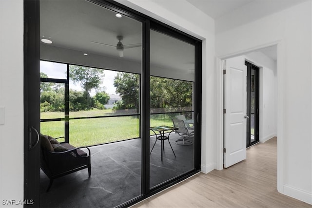 interior space featuring ceiling fan