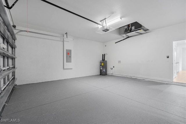 garage featuring a garage door opener, water heater, and electric panel