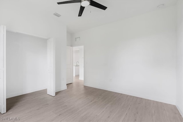 interior space featuring light hardwood / wood-style flooring and ceiling fan