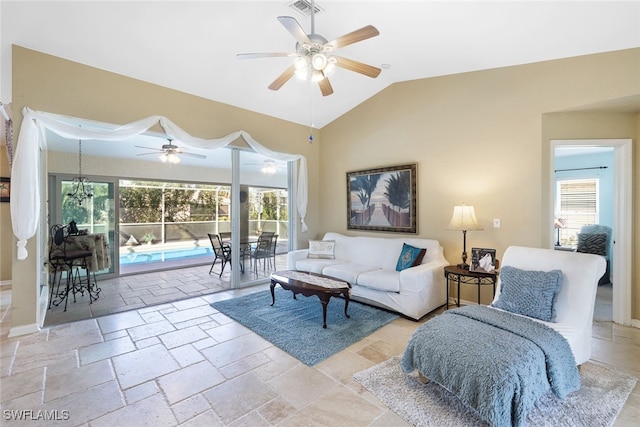 living room with vaulted ceiling, ceiling fan, and plenty of natural light