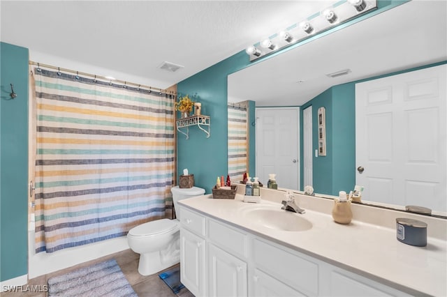 full bathroom with tile patterned floors, vanity, toilet, and shower / bathtub combination with curtain