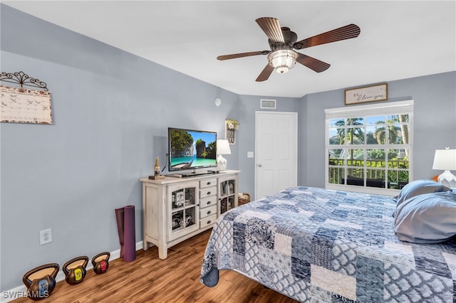 bedroom featuring ceiling fan and hardwood / wood-style floors