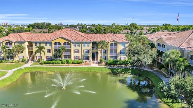 bird's eye view with a water view