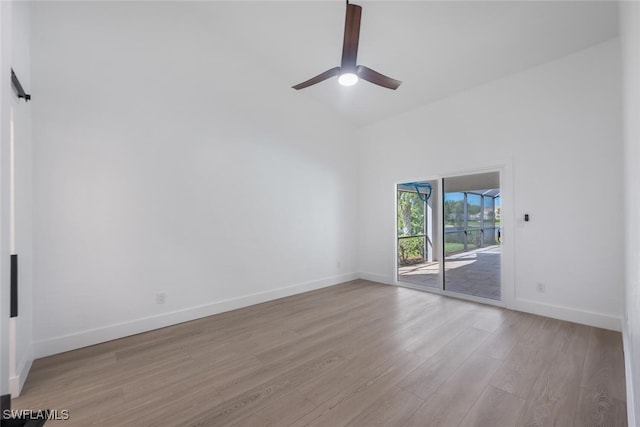 spare room with ceiling fan and light hardwood / wood-style flooring