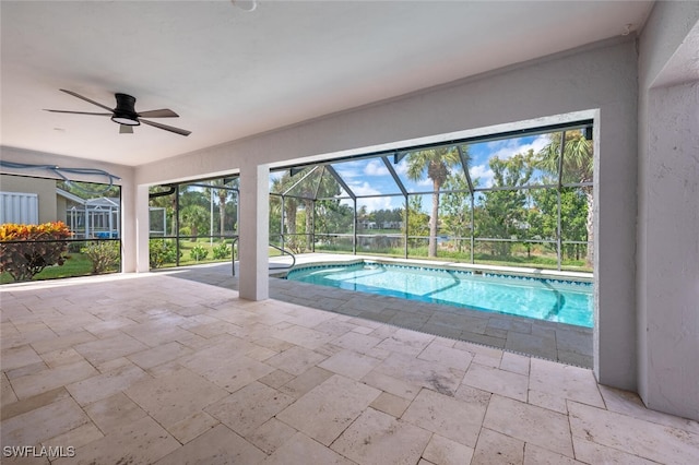 view of swimming pool featuring ceiling fan