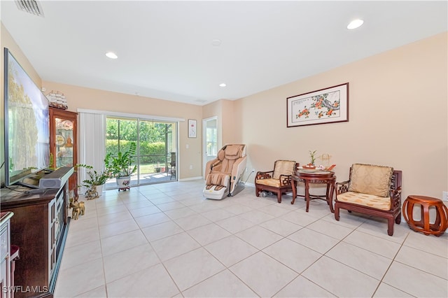 sitting room featuring light tile patterned floors