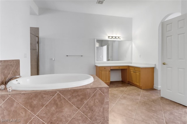 bathroom with vanity, tile patterned flooring, and separate shower and tub