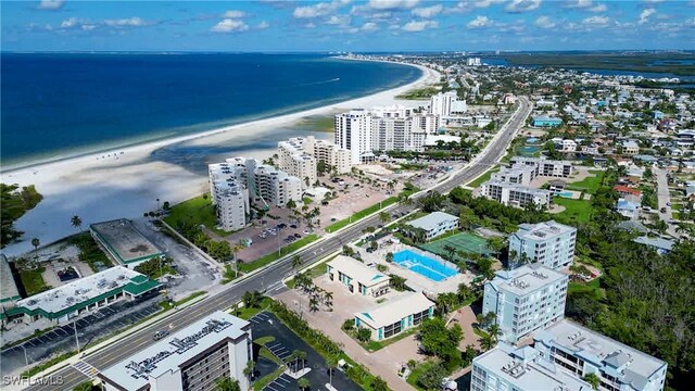 aerial view featuring a view of the beach and a water view