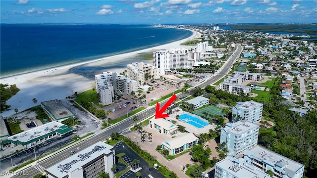 bird's eye view with a view of the beach and a water view