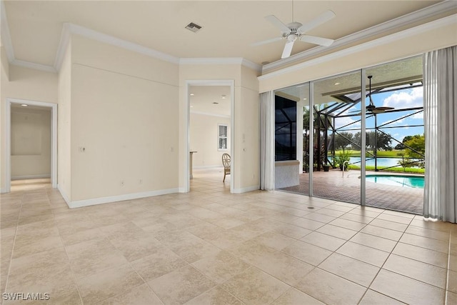 empty room featuring ceiling fan and ornamental molding