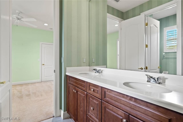 bathroom featuring vanity and ceiling fan