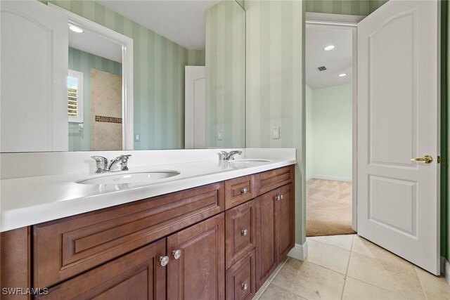 bathroom featuring tile patterned floors and vanity