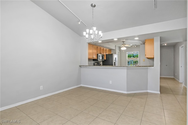 kitchen with ceiling fan with notable chandelier, light brown cabinets, light tile patterned floors, stainless steel appliances, and light stone countertops