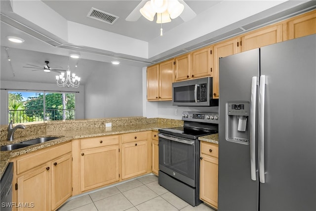 kitchen featuring light stone countertops, light brown cabinets, sink, stainless steel appliances, and ceiling fan with notable chandelier