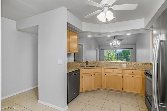 kitchen featuring sink, kitchen peninsula, black appliances, ceiling fan with notable chandelier, and vaulted ceiling