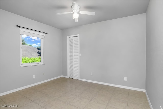 spare room featuring ceiling fan