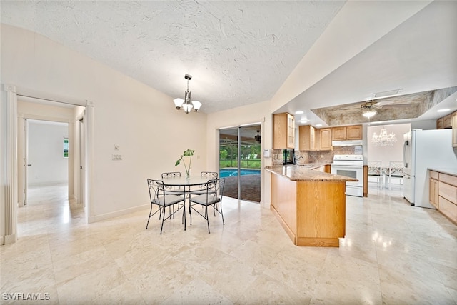 kitchen featuring kitchen peninsula, white appliances, a textured ceiling, backsplash, and ceiling fan with notable chandelier