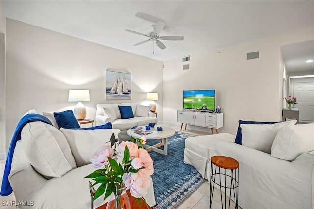 living room featuring ceiling fan