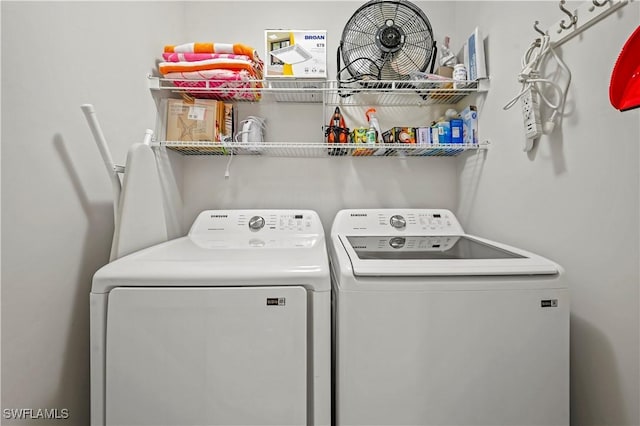 laundry area with washer and dryer