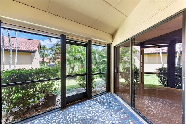 unfurnished sunroom with a healthy amount of sunlight